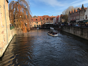 Long-distance chauffeured car to Bruges in Belgium - Bruges boat on the channel